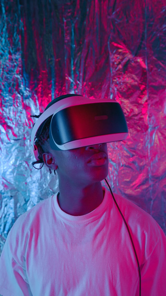 Person wearing VR headset in a vibrant, metallic setting. Engaged in virtual reality gaming.